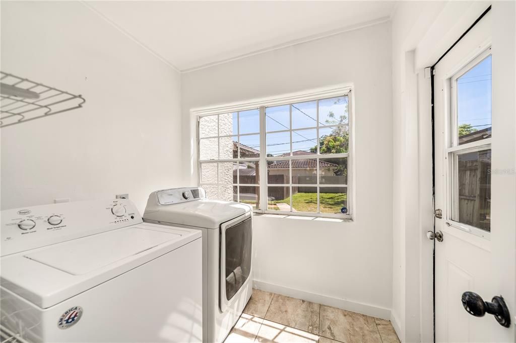 Interior Laundry just off Kitchen and access to Rear Yard