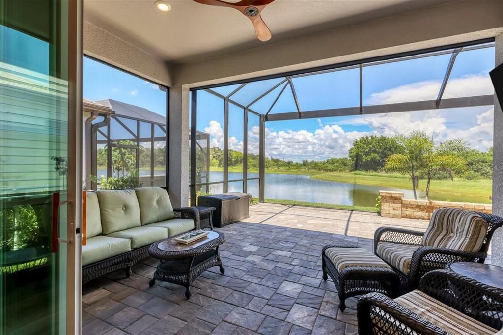 Over-sized covered lanai; panoramic clear view screen, upgraded pavers and more