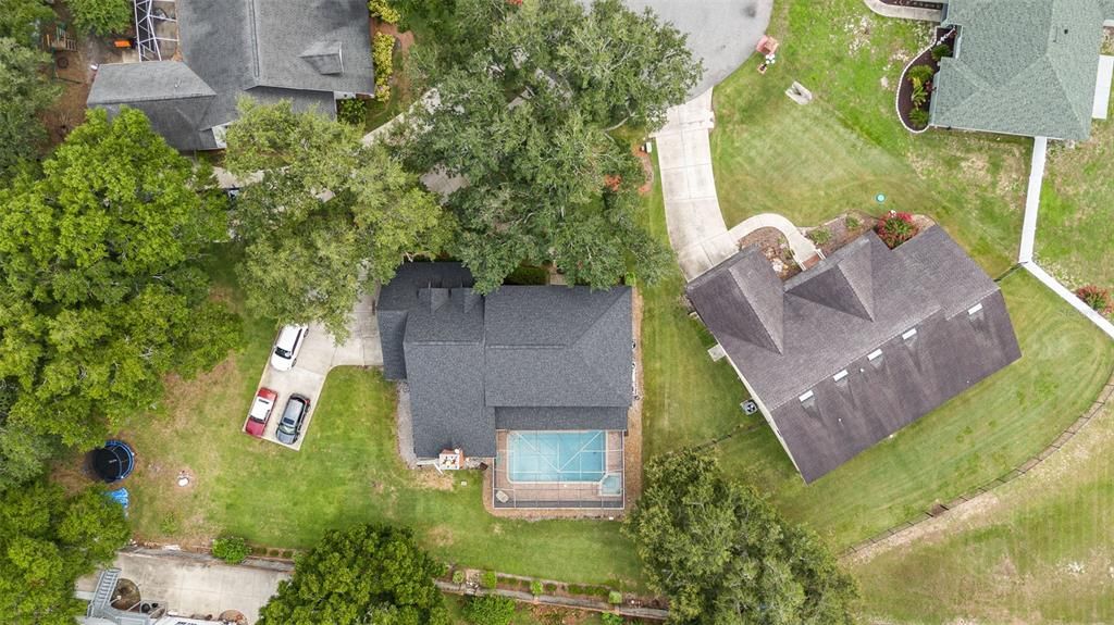 This stunning 4-bed, 3-bath brick pool home sits proudly on nearly half an acre, with towering oak trees in a quiet cul-de-sac within the desirable gated community of Lake Deeson Pointe.