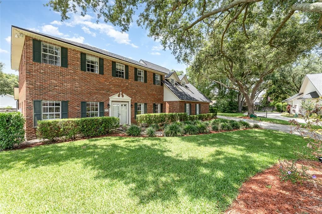 Stunning 4-bed, 3-bath brick pool home sitting proudly on nearly half an acre