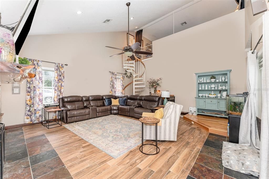 A large game or bonus room offers endless possibilities for entertainment or relaxation.