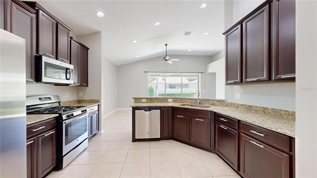 Kitchen showing stainless steel appliances and ample cabinets