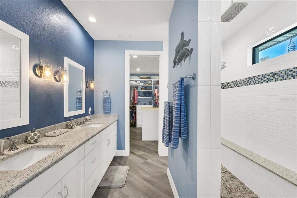 Primary bathroom with quartz counters and dual sinks