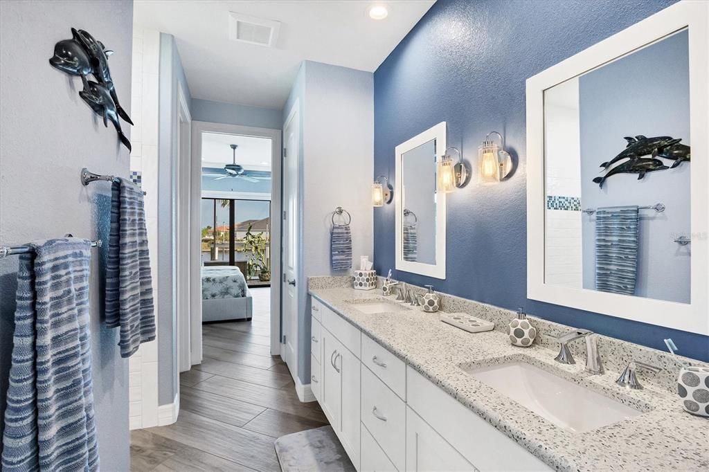 Primary bathroom with quartz counters and dual sinks