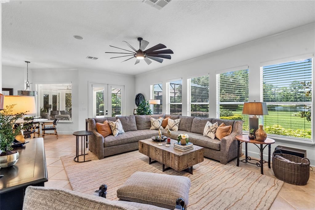 Large windows overlooking the backyard