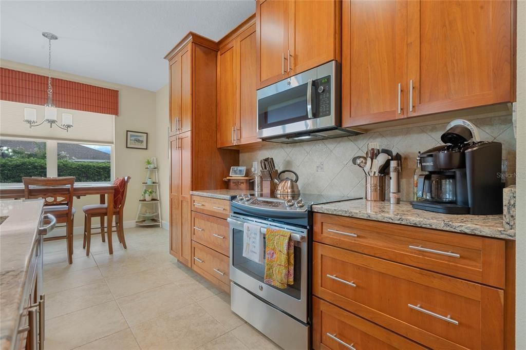 Stainless Steel Appliance Package, Tile Backsplash and Cambria Quartz Countertops