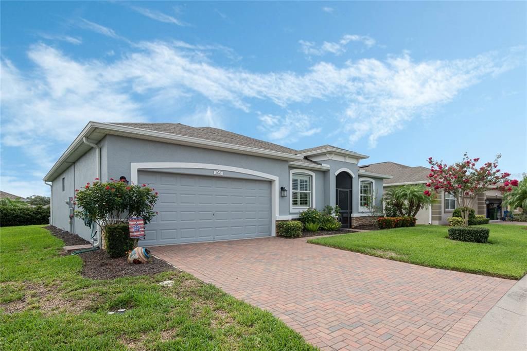 Paved Drive Way, 2 Car Garage with Golf Cart Niche