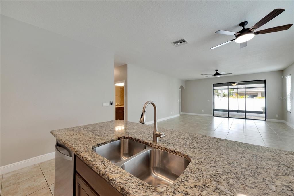 Newer Stainless appliances provide all the modern conveniences in the Kitchen. Granite counters make clean-up easy!