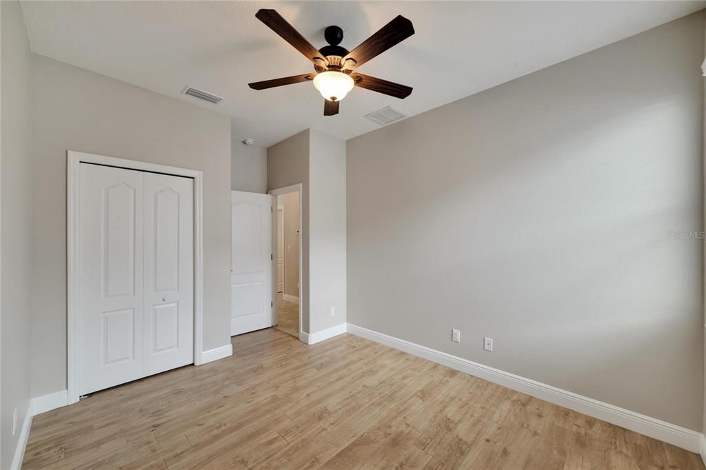 Primary Bathroom with large walk-in shower, soaking tub, private water closet, and double sinks.