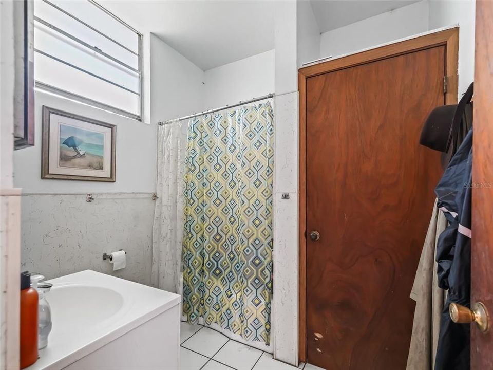 Full 3rd Bath with Adjacent Laundry Room