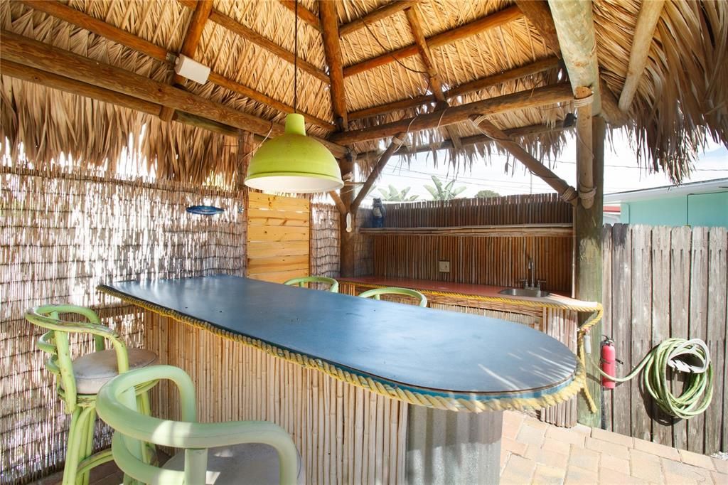 Tiki bar in private fenced backyard