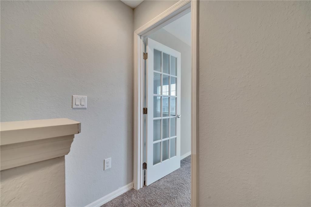 2nd bedroom entrance with French style glass door