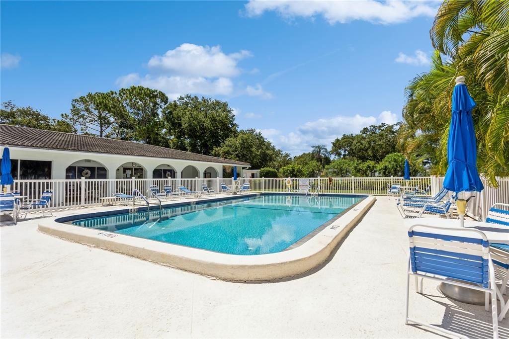 Beautiful pool with covered space.