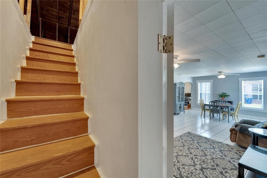 Stairs leading to attic space.