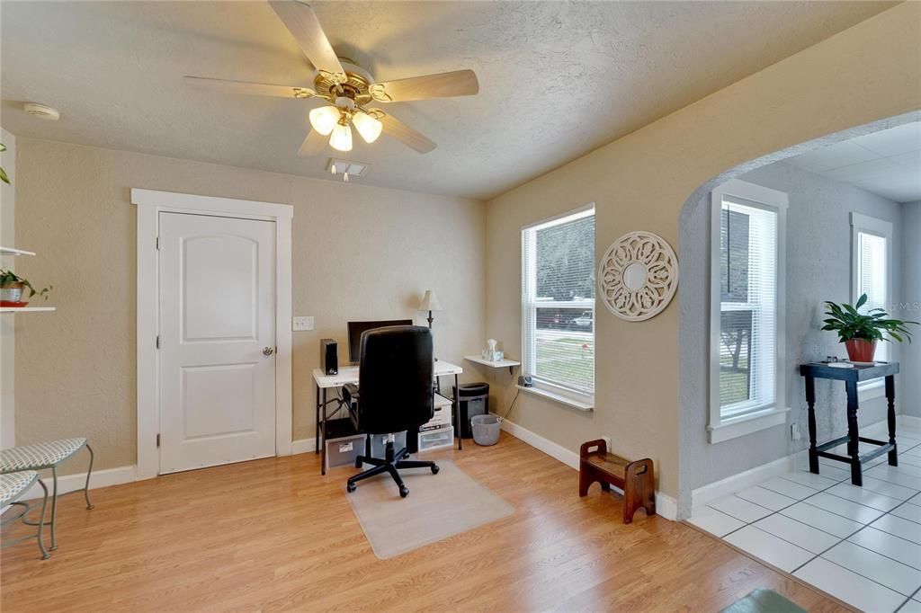 Office with door to "breezeway" room that connects to other home.