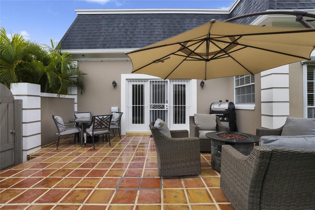 Rear terra cotta patio in back courtyard