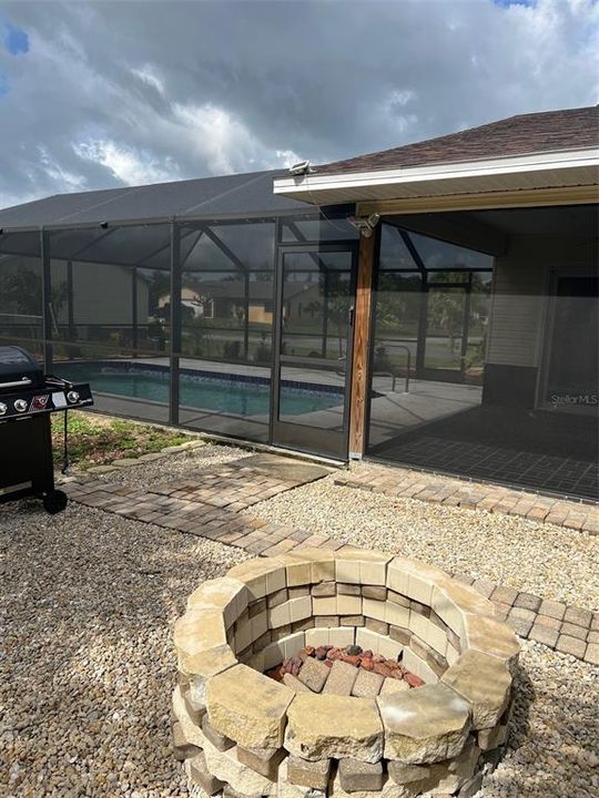 Fire pit off pool