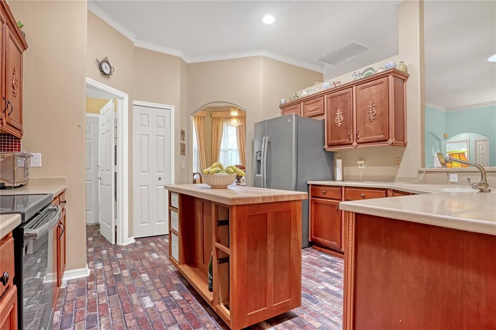 Spacious kitchen.  Kitchen island is not fixed and won't convey.