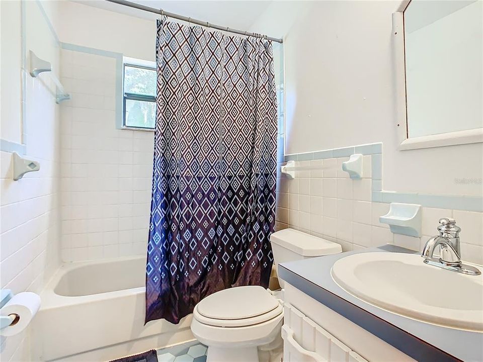 Bathroom #3 is between bedroom #3 and #4 and has tub/shower combination