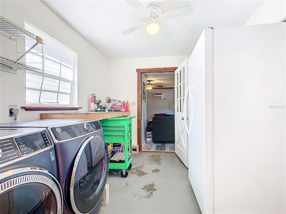 Laundry room and storage area.