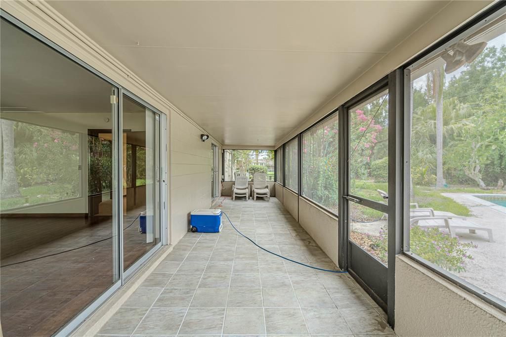 33' x 7' Screened Lanai overlooking the backyard and pool