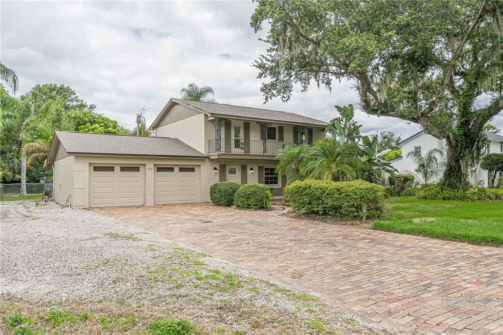 Beautiful Brick Paver Driveway and extra parking pad