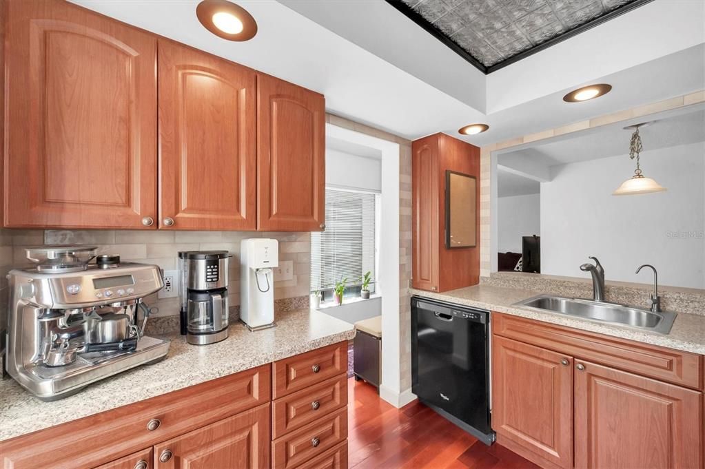 Kitchen overlooks dining area