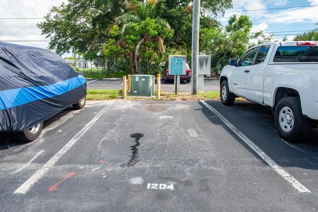 Assigned parking immediately in front of garage entry