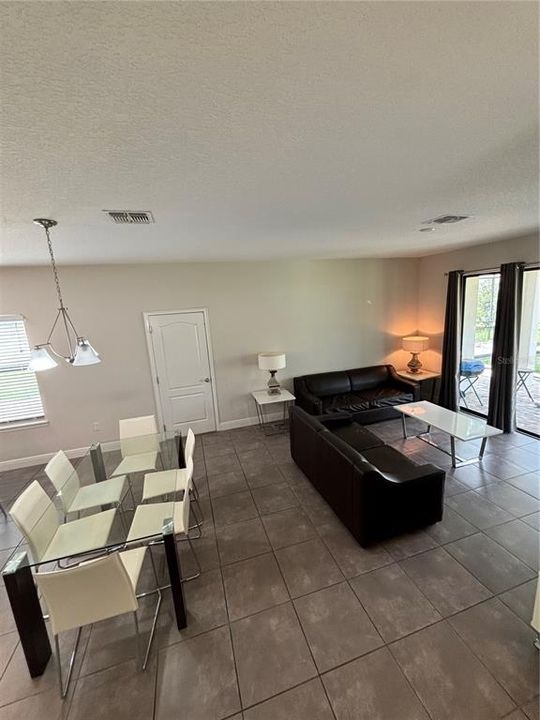 LIVING ROOM OPEN PLAN TO DINING & KITCHEN