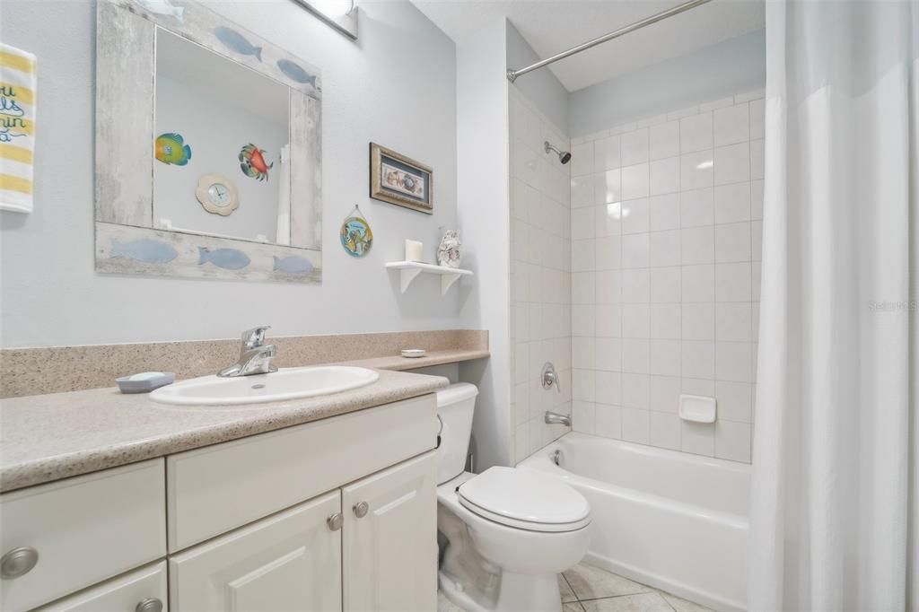 Guest Bathroom with a Tub Shower Combination