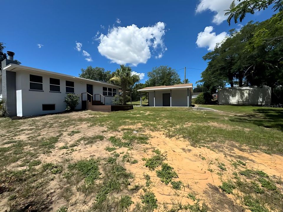 huge backyard, two storage, one can be converted into living space