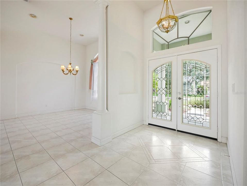 Front Door and Dining Room