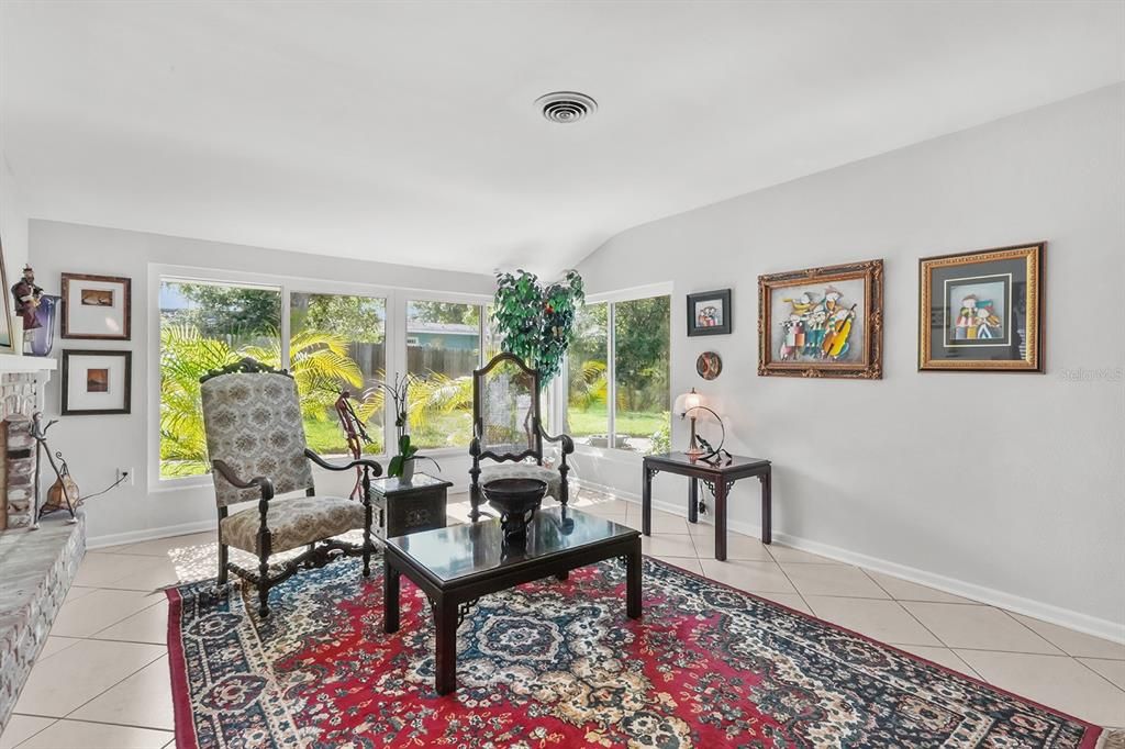 Living Room with Wood Burning Fireplace