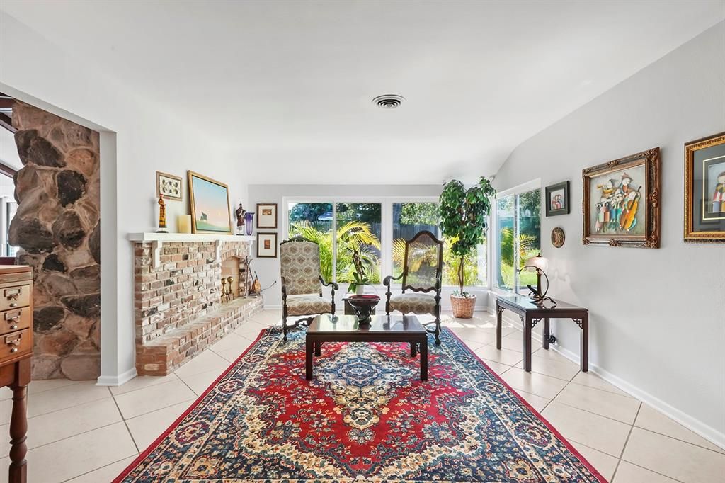 Living Room with Wood Burning Fireplace