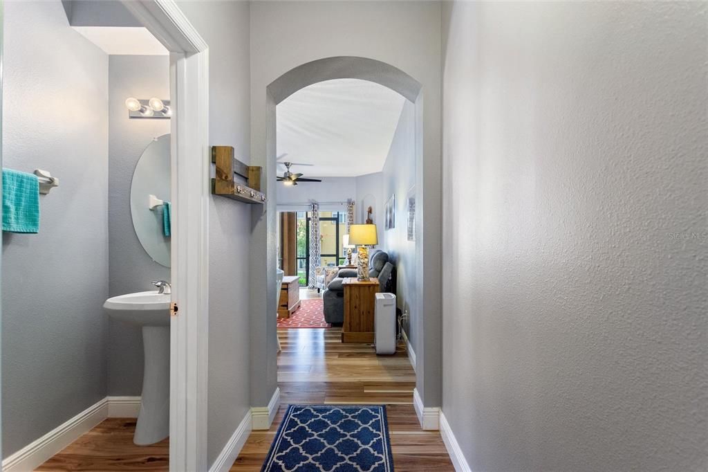 When you enter into the townhome, the guest bath is on the left, and the family room invites you into a bright open relaxing area.