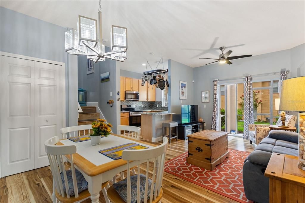 Open concept with the dining and family room looking into the kitchen.