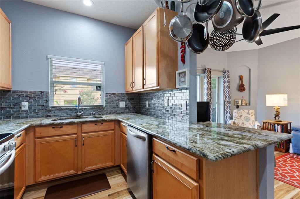 Th kitchen has the right amount of countertop space for preparing a meal.