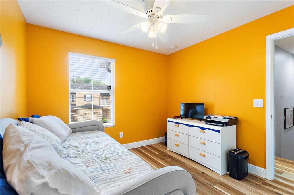 Another view of the guest bedroom looking out to the front yard.