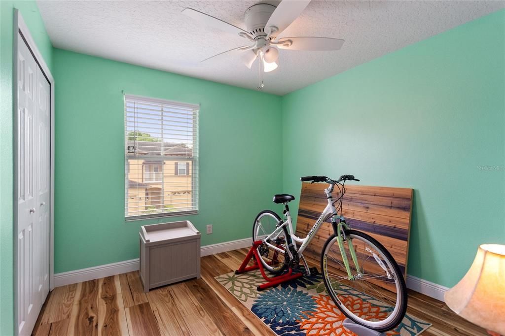 The guest bedroom is used as a workout room.