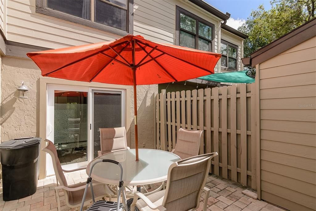 Front private patio, Kitchen sliding door in back ground