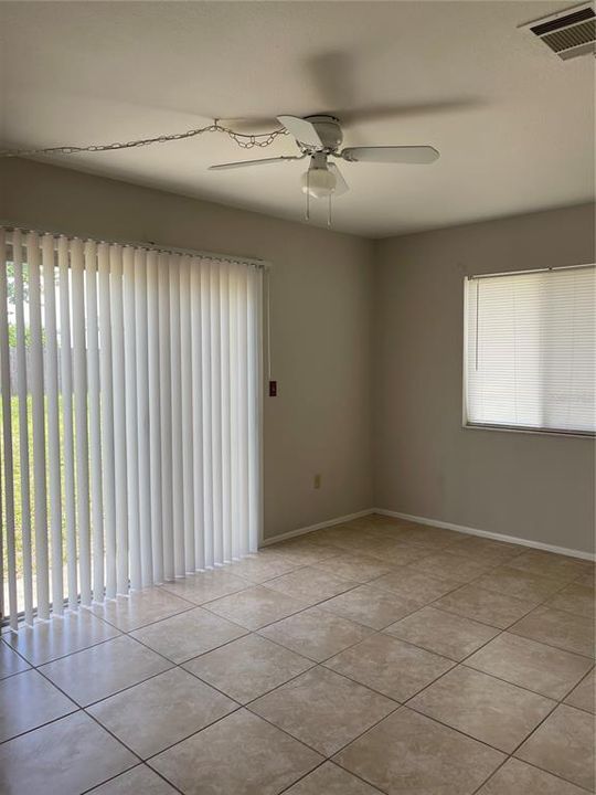 Family room with sliders to backyard