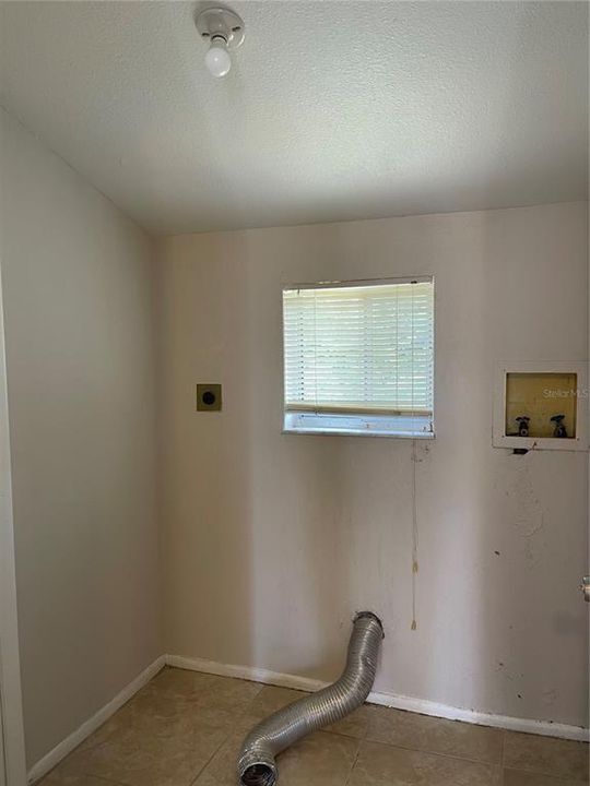 Laundry room off the garage