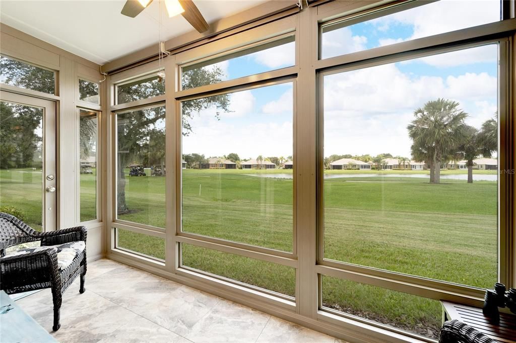 enclosed lanai with tinted windows and motarized shades