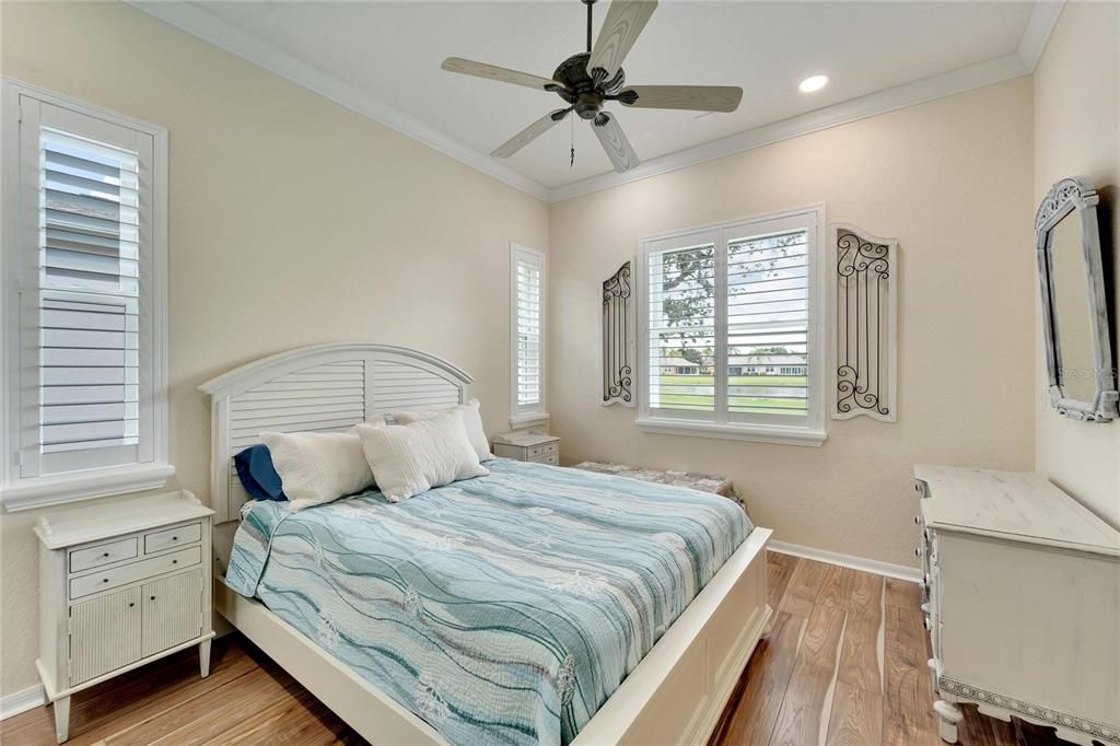 bedroom 2 has crown molding and nice fan