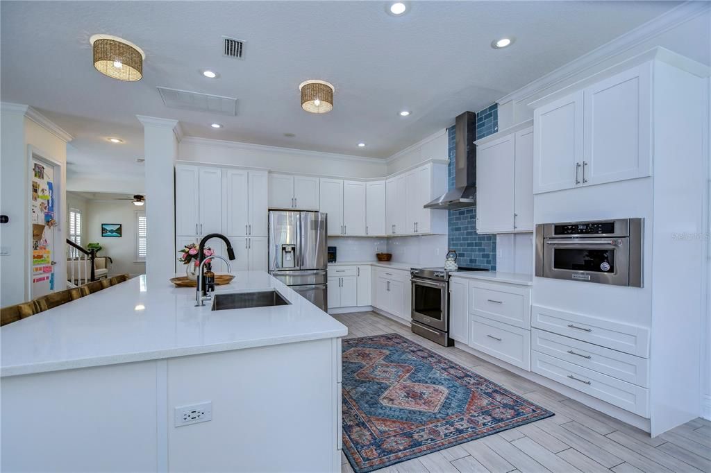 Magnificent center island stretching over 12 feet and quartz countertops!