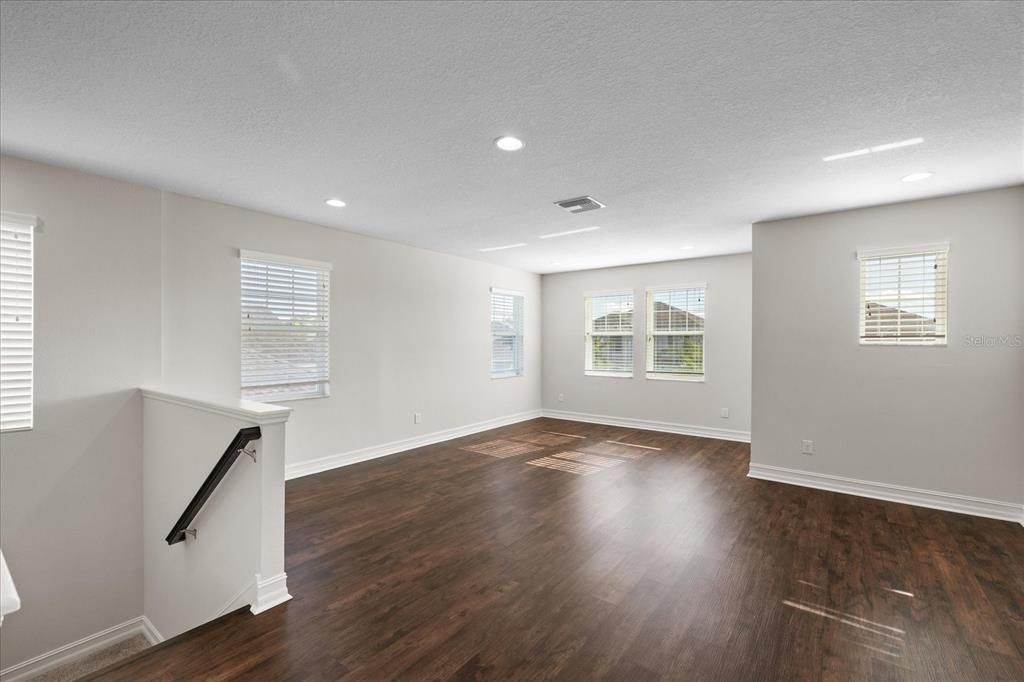 Loft area upstairs for playroom, hang out area, office or more.