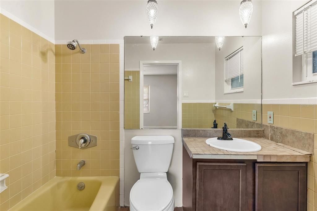 Primary Bathroom with Tub and Shower Combo