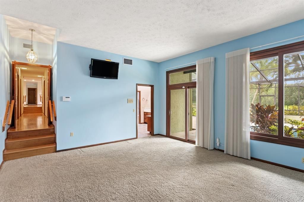 Primary bedroom features French door entrance!