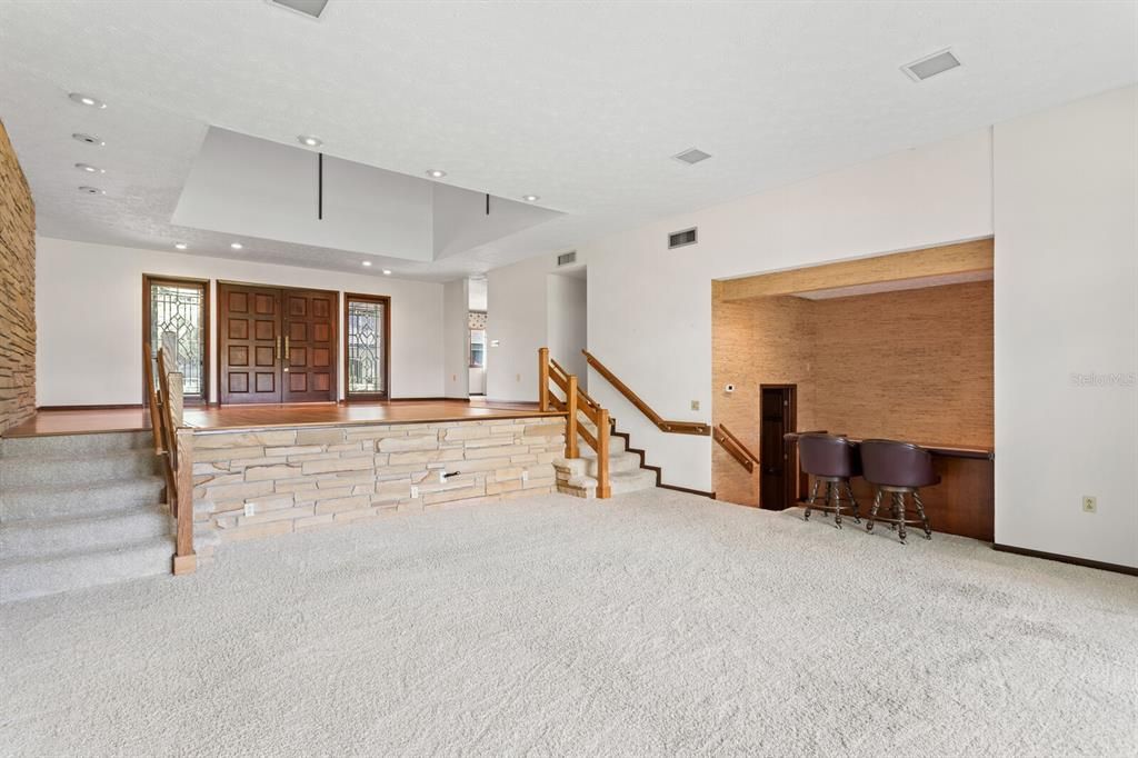 Grand great room with wet bar- perfect for entertaining!