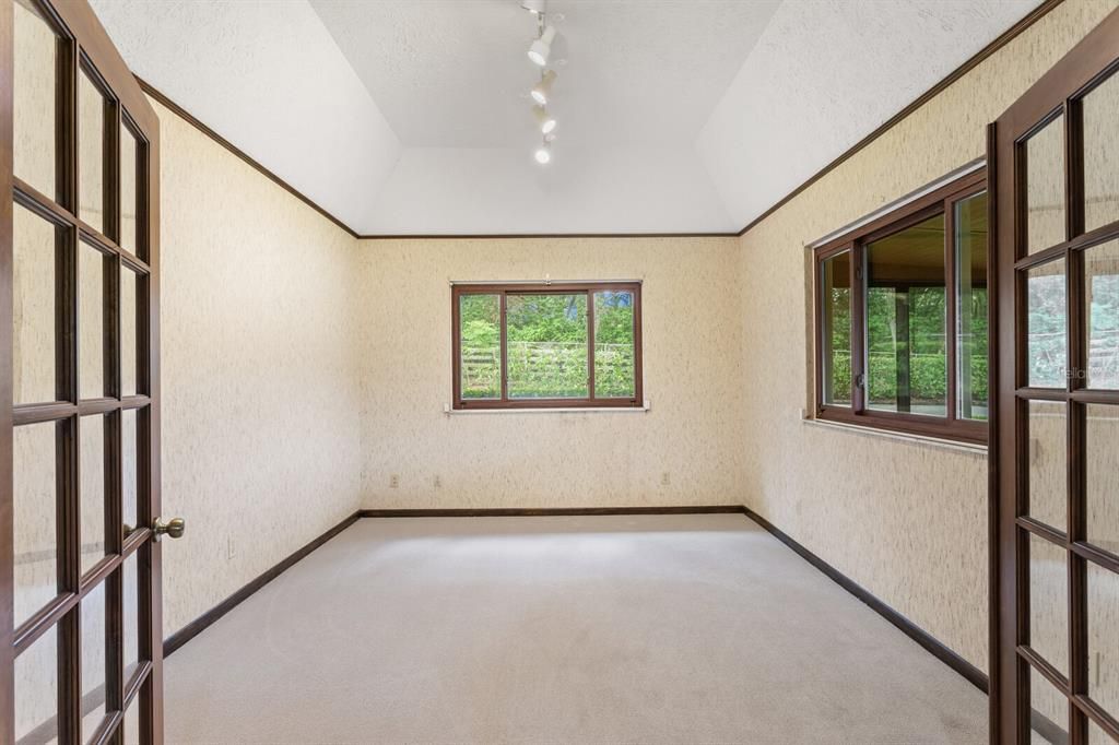 Bonus room with glass French doors!